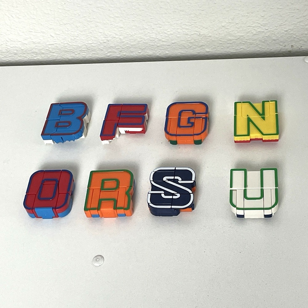 ALPHA BOTS Alphabet Transforming Robot Letters LOT of 8